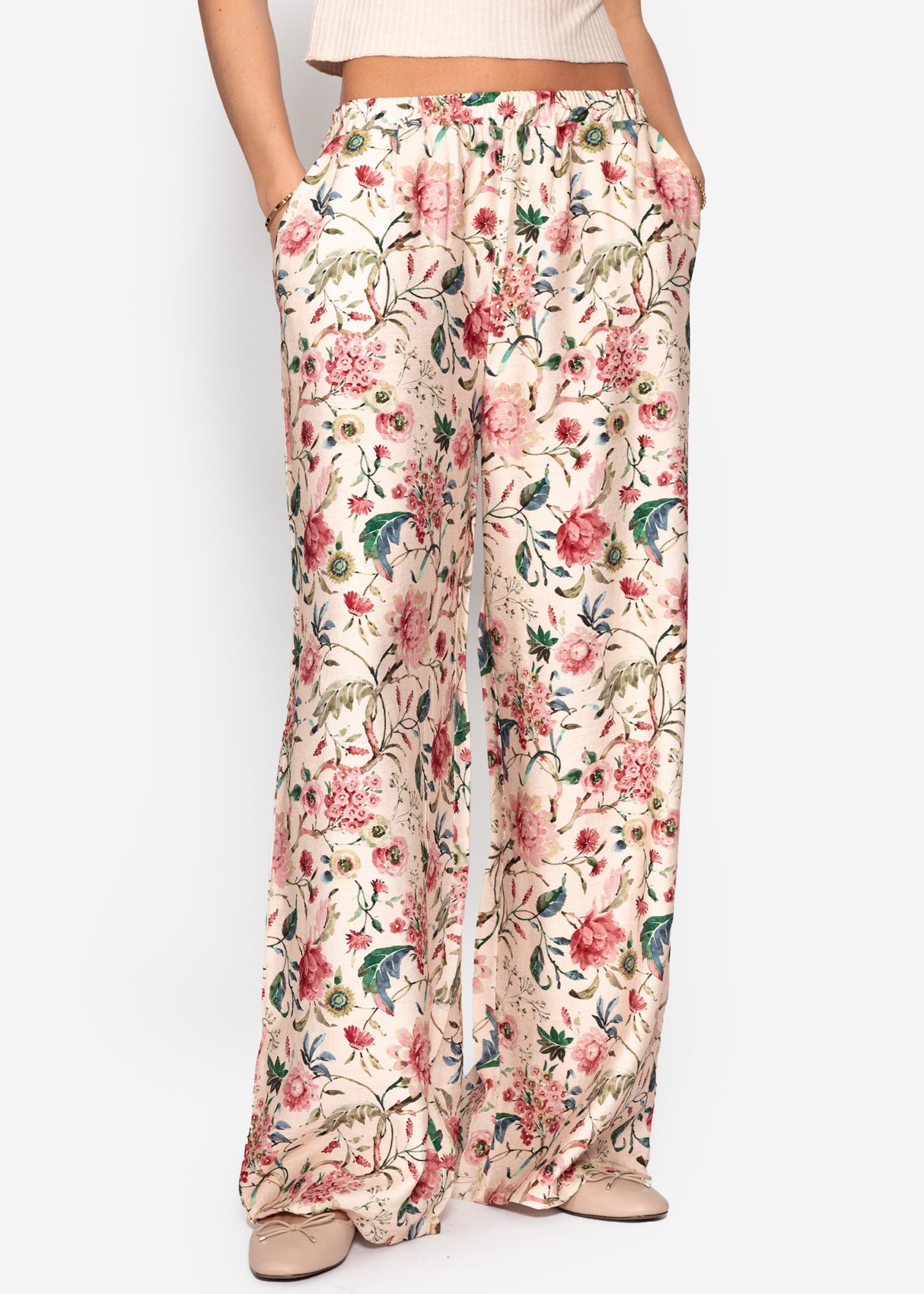 Pants with floral pressure - beige