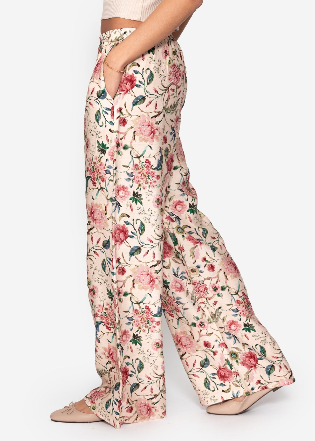 Pants with floral pressure - beige