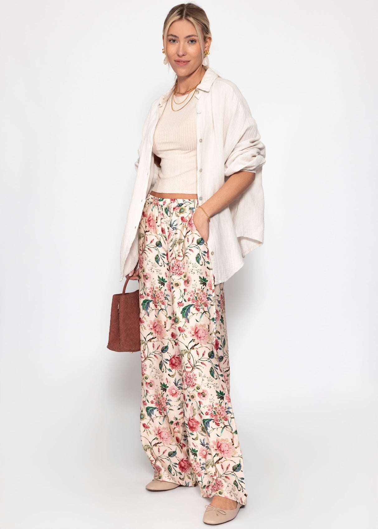 Pants with floral pressure - beige
