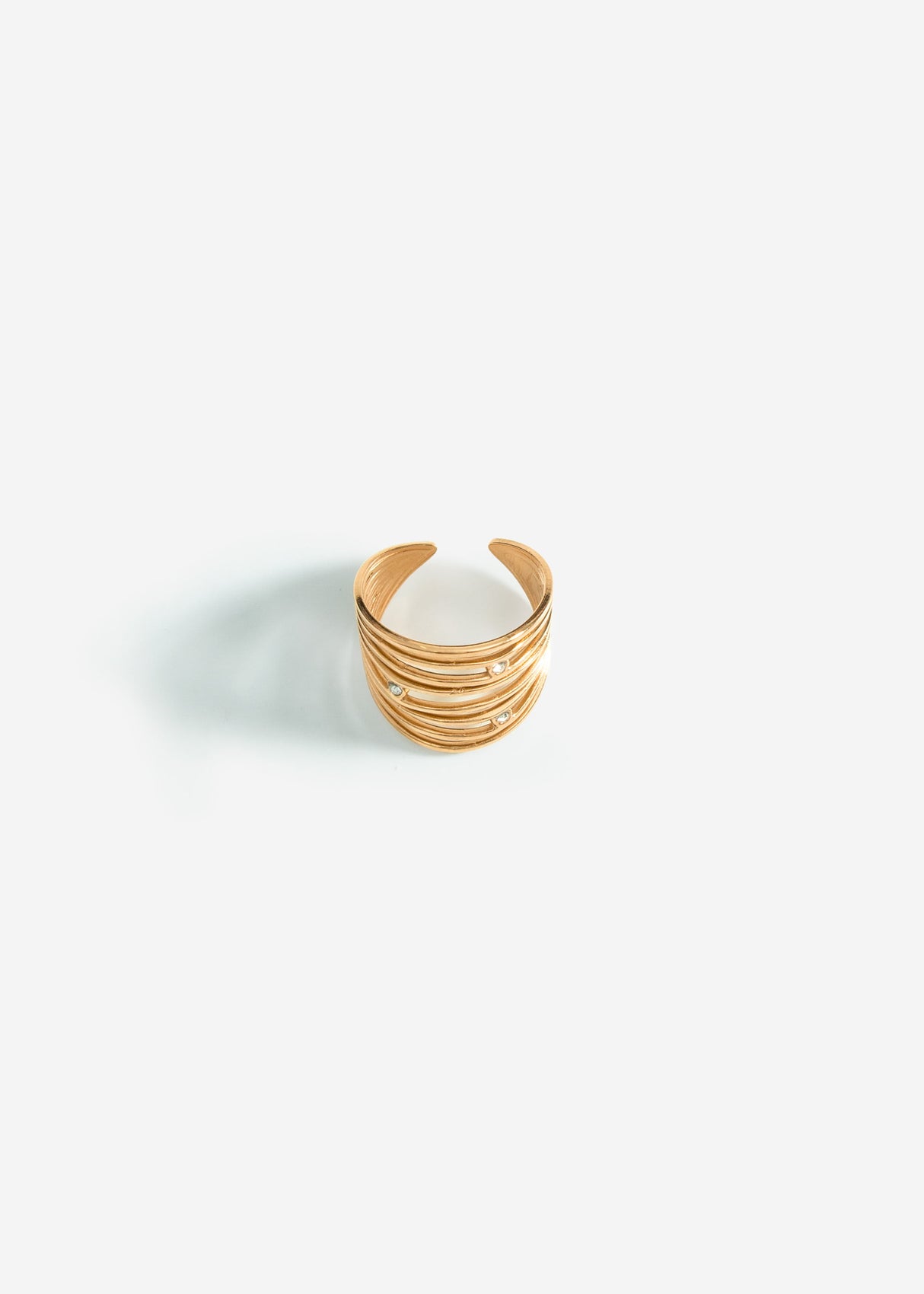 Multi-row ring with offset stones - gold