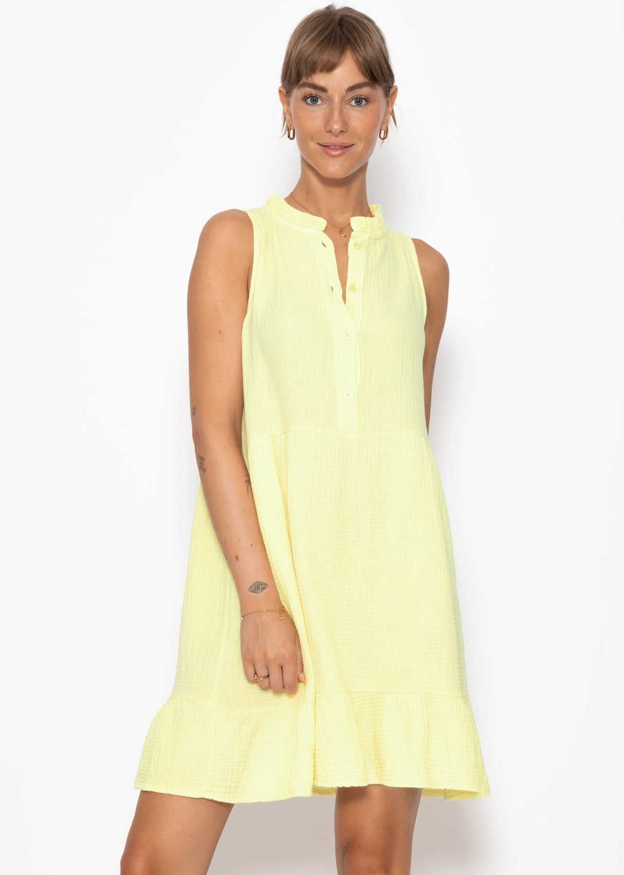 Small Musselin dress with ruffles - butter yellow