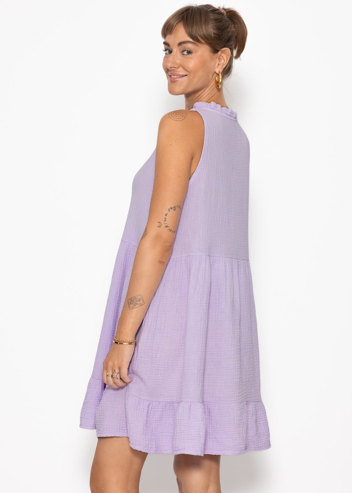 Small Musselin dress with ruffles - lilac