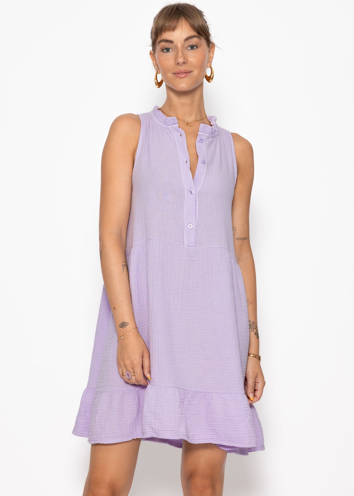 Small Musselin dress with ruffles - lilac