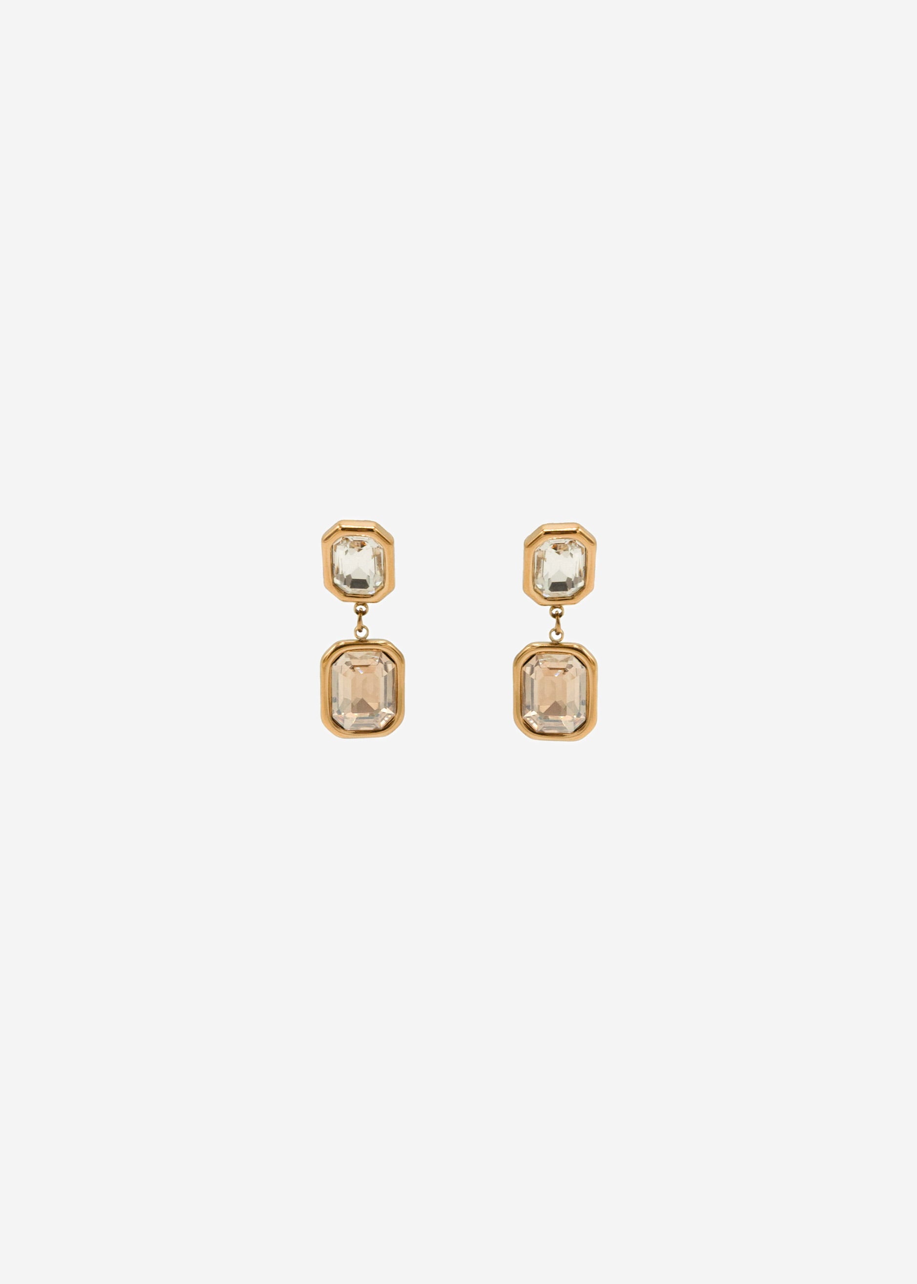 Elegant earrings with light gemstones - gold