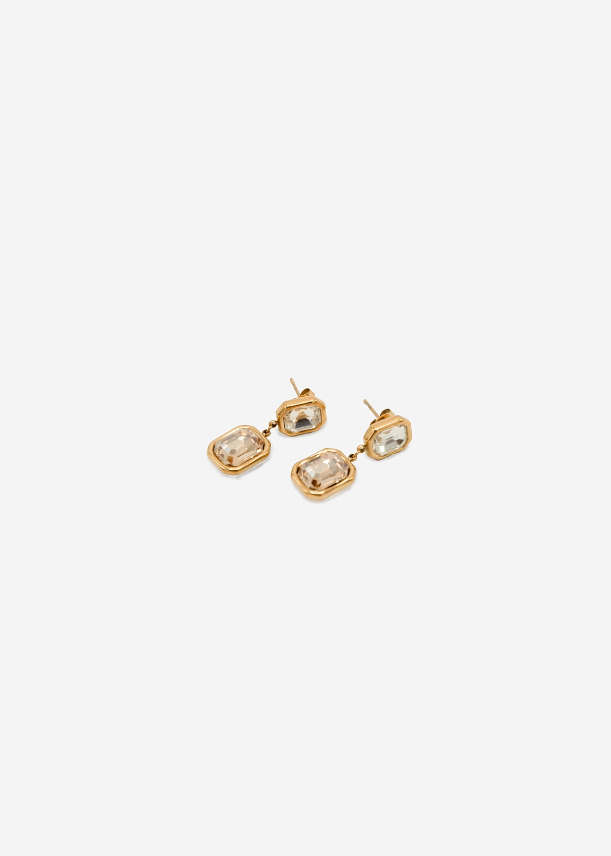 Elegant earrings with light gemstones - gold