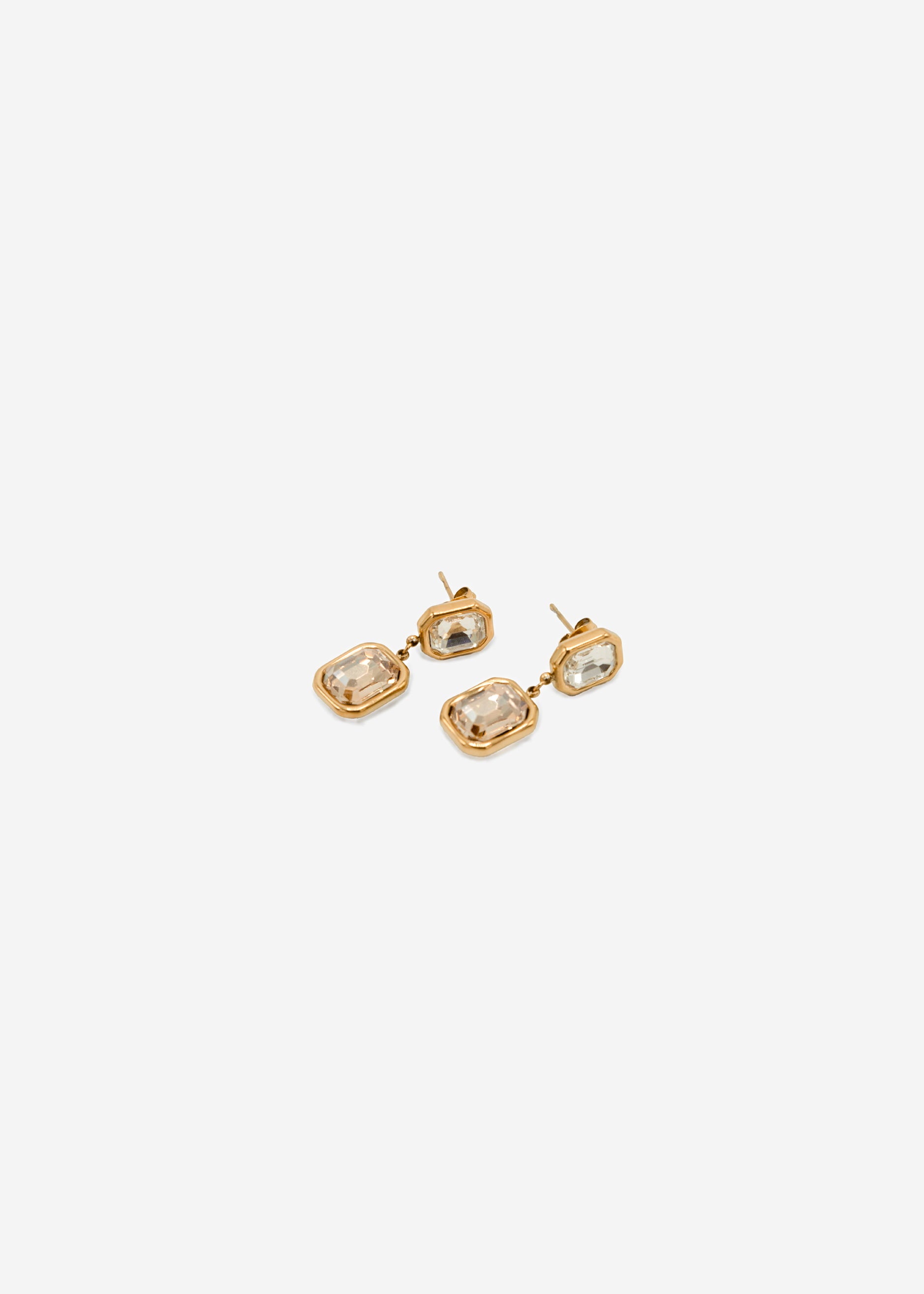 Elegant earrings with light gemstones - gold