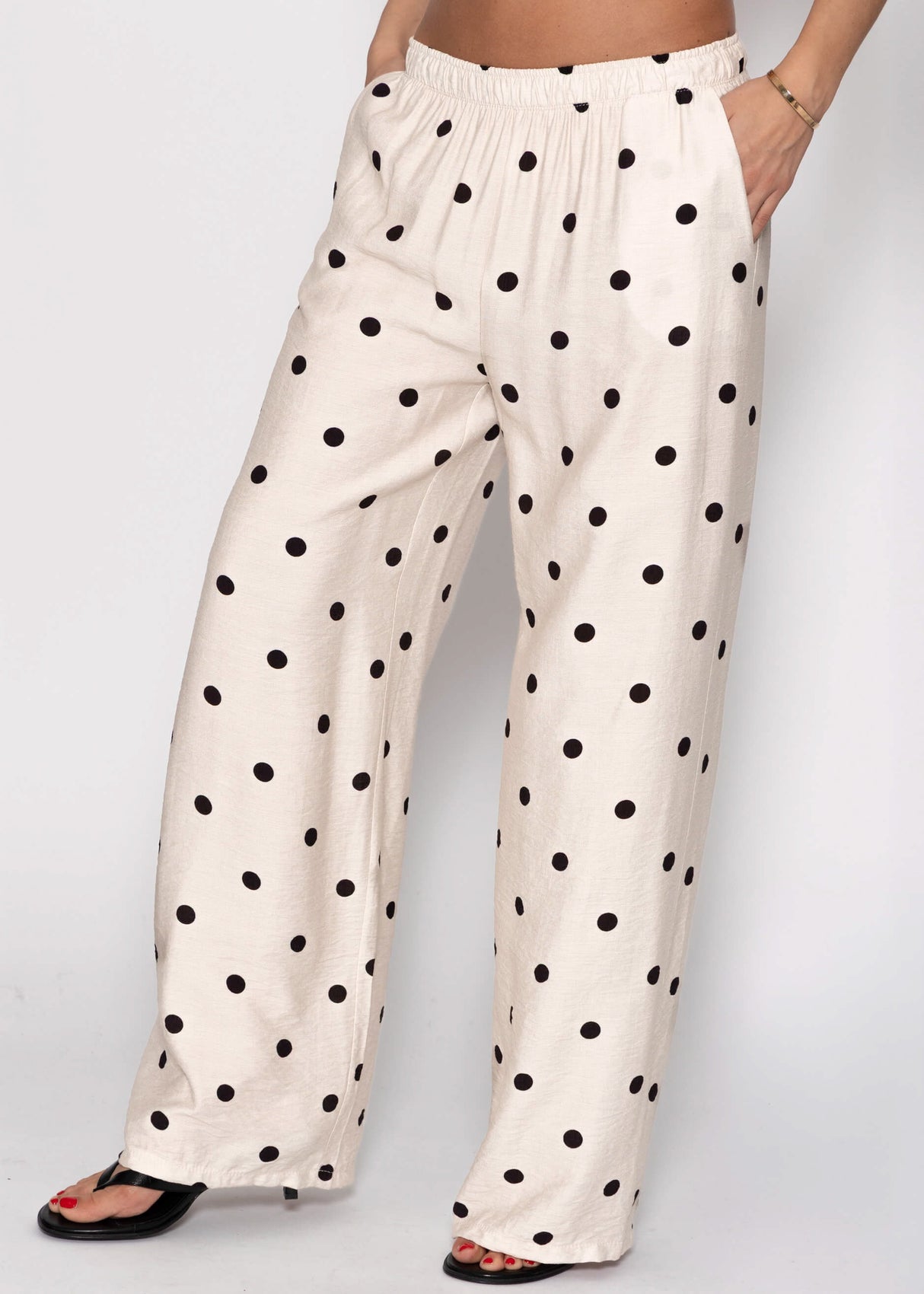 Gepunktete Hose mit weitem Bein - hellbeige