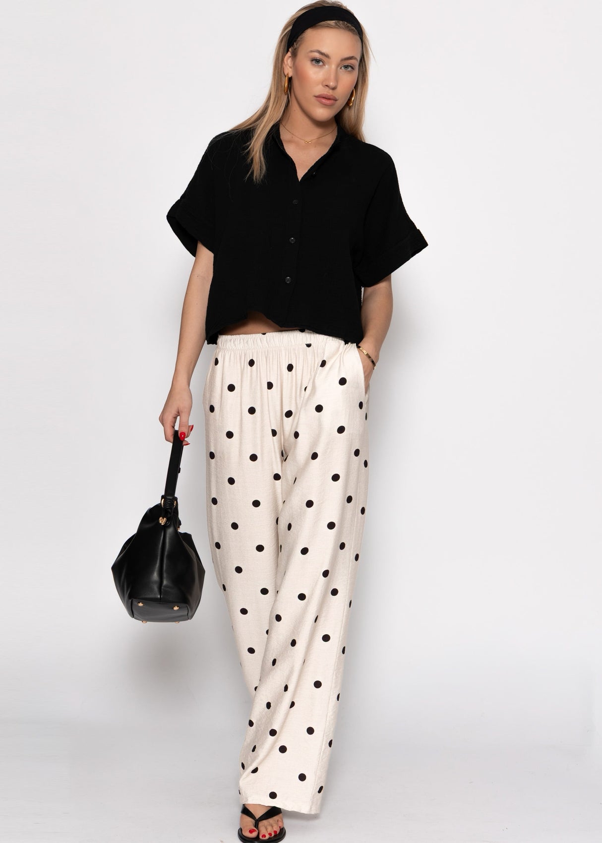 Gepunktete Hose mit weitem Bein - hellbeige