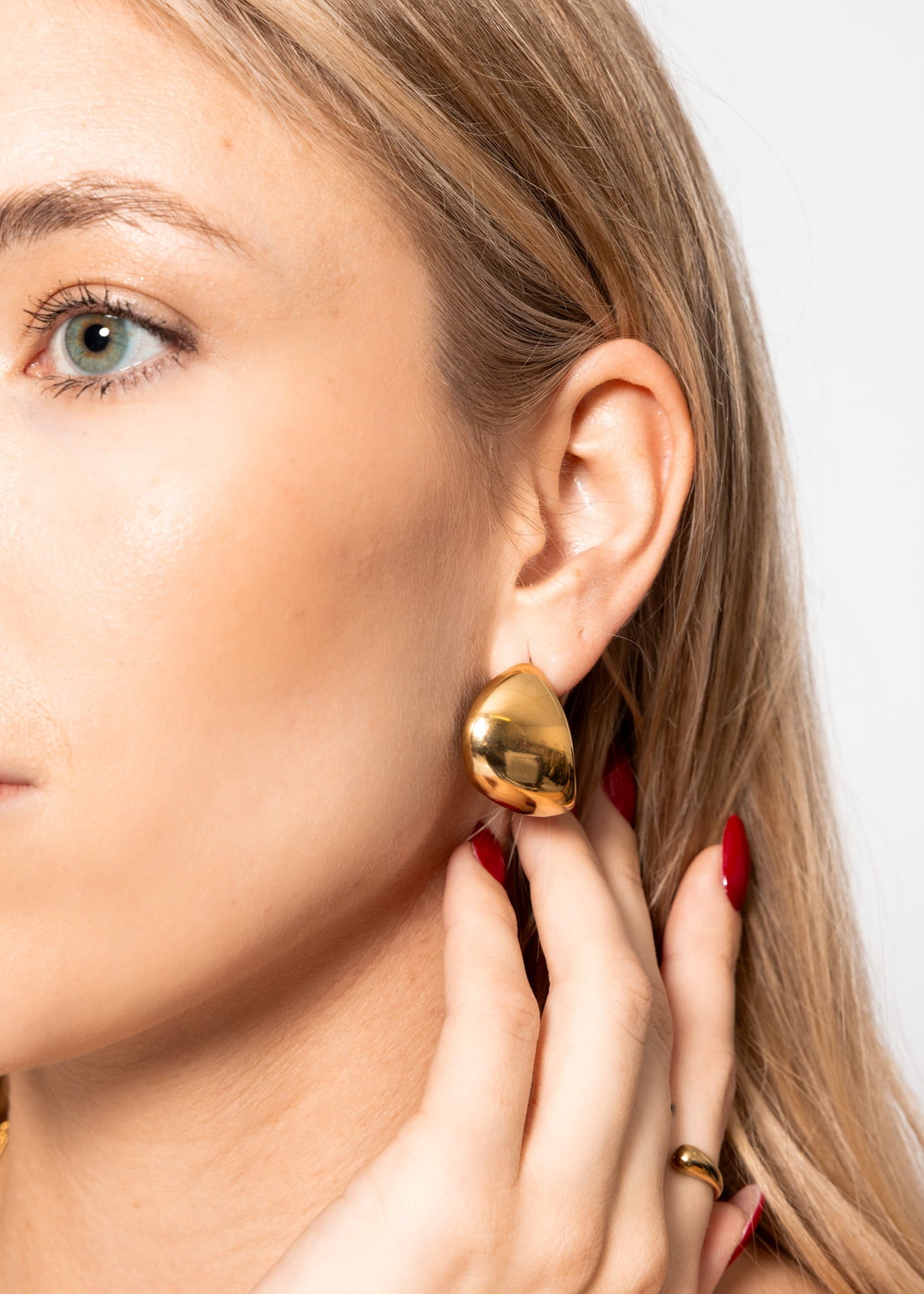 Geschwungene Creolen - gold