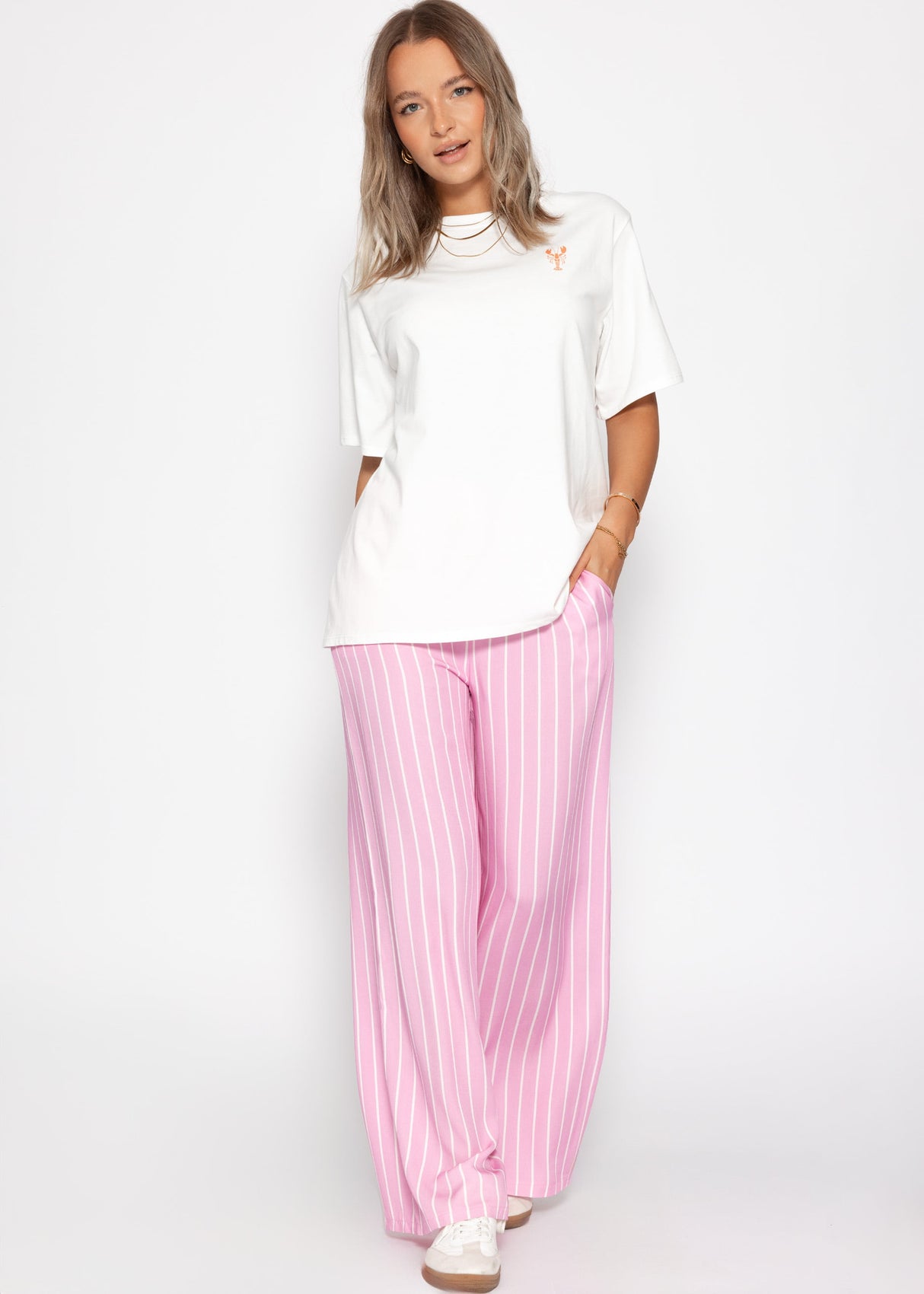 Gestreifte Hose mit weitem Bein - rosa