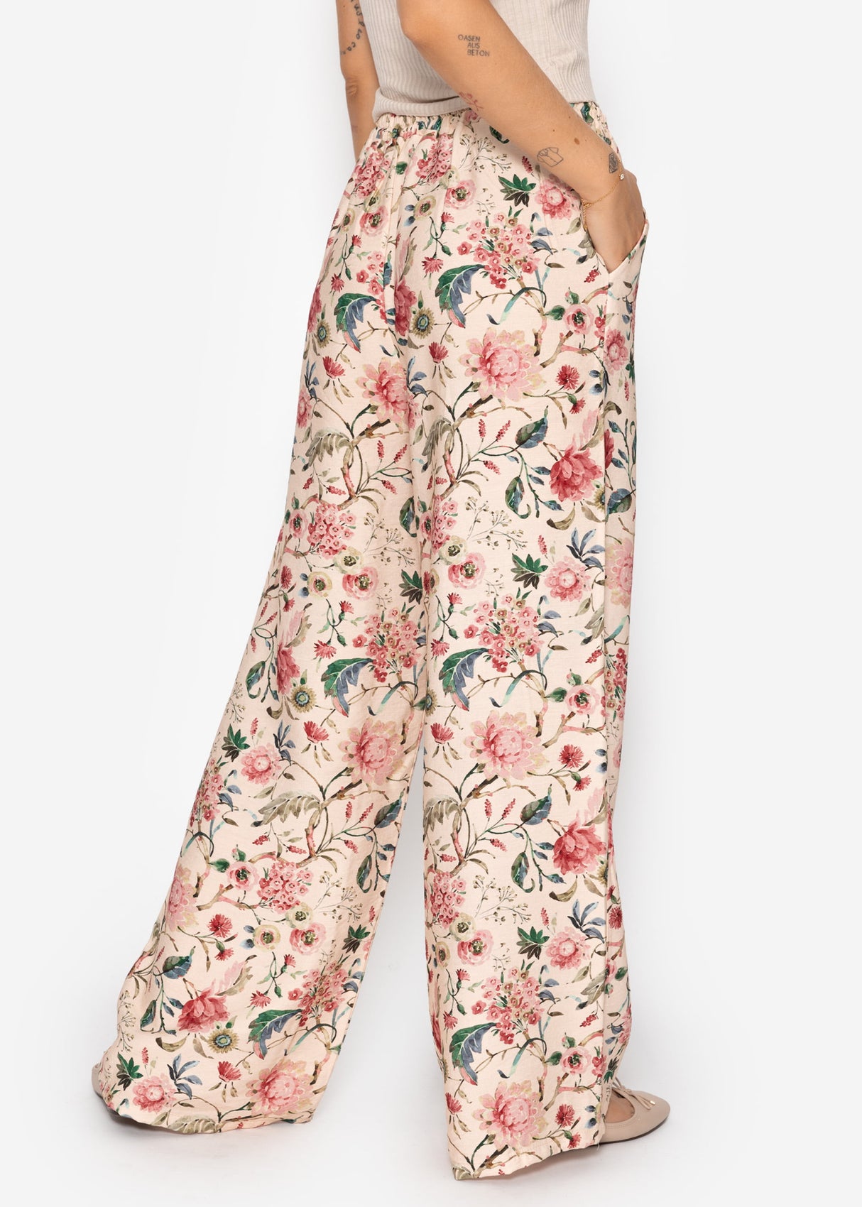 Pants with floral pressure - beige