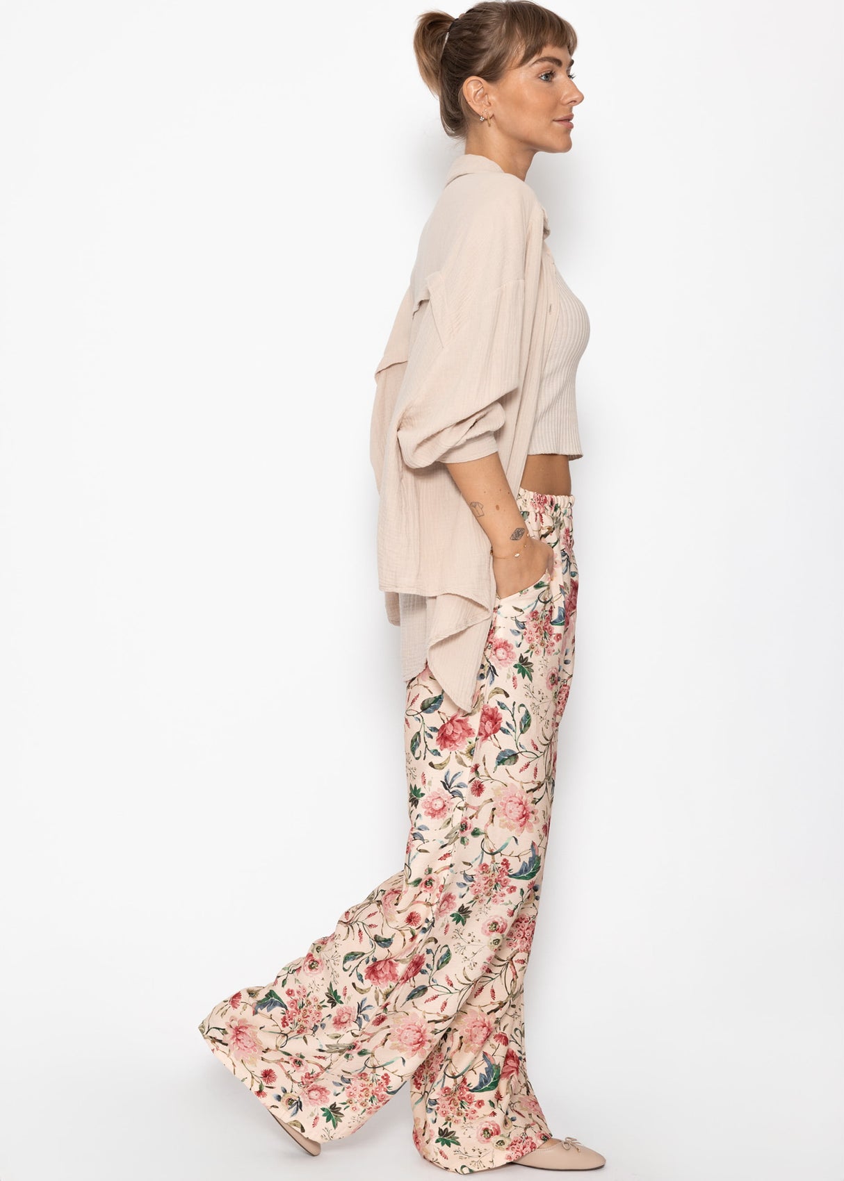 Pants with floral pressure - beige