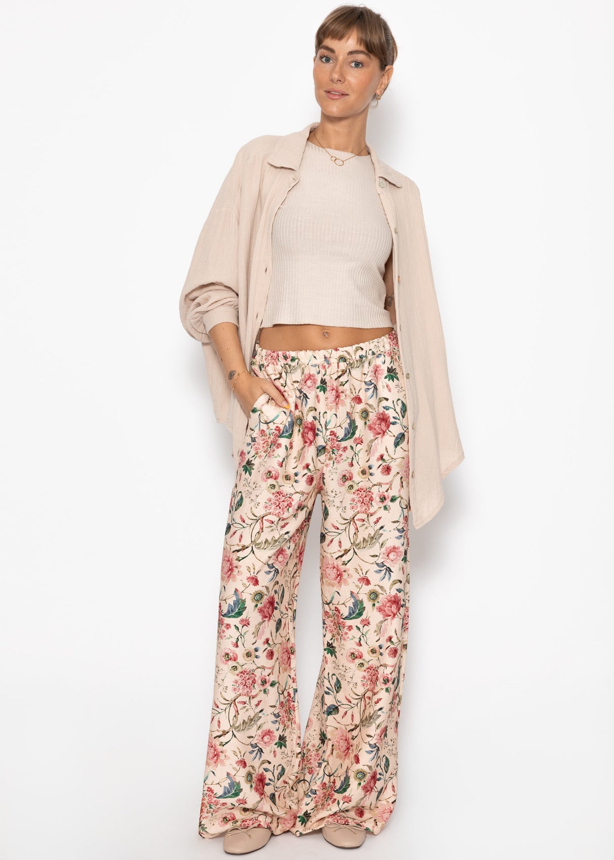 Pants with floral pressure - beige