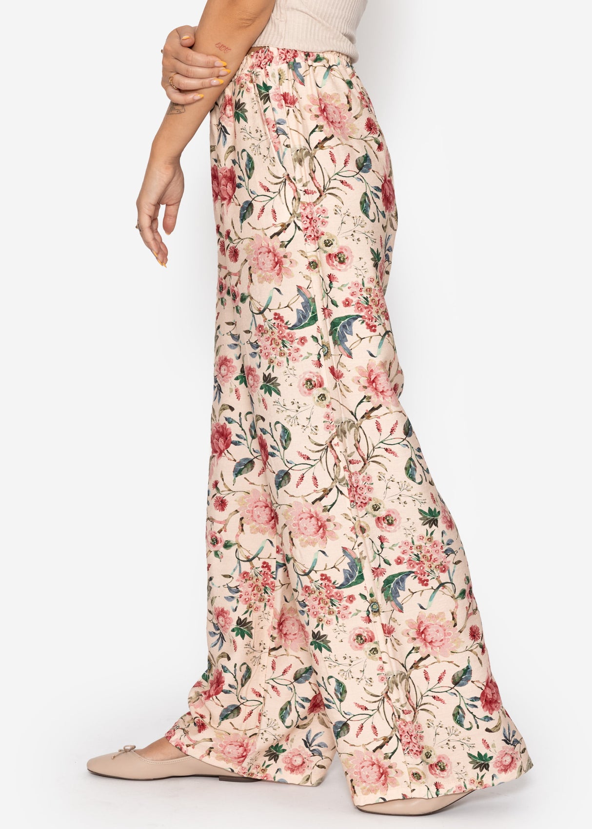 Pants with floral pressure - beige