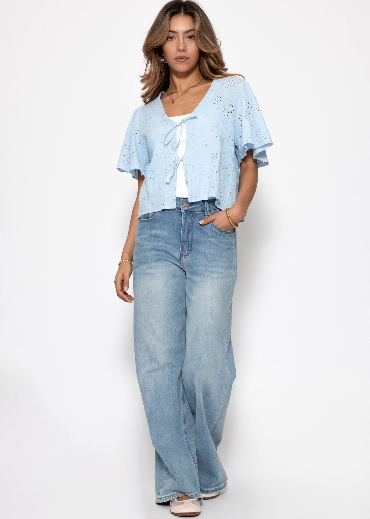 Muslin blouse with tie fastening and eyelet embroidery - light blue