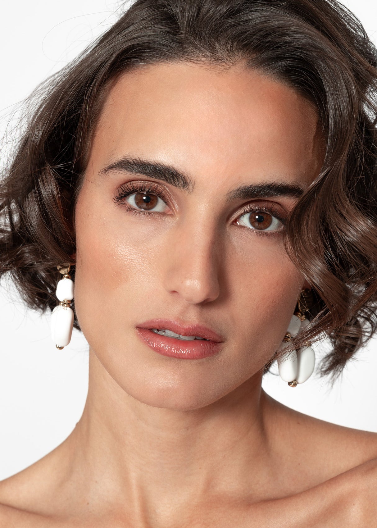 Gold earrings with large pearls, matt white