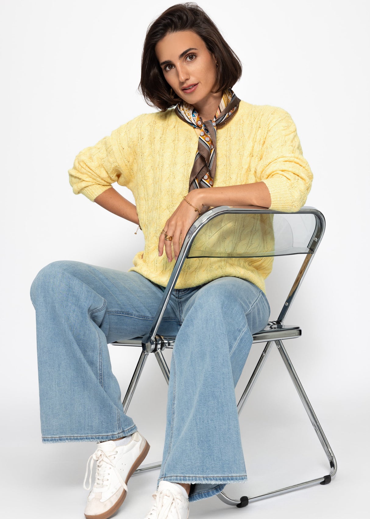 Sweater with a cable pattern - yellow