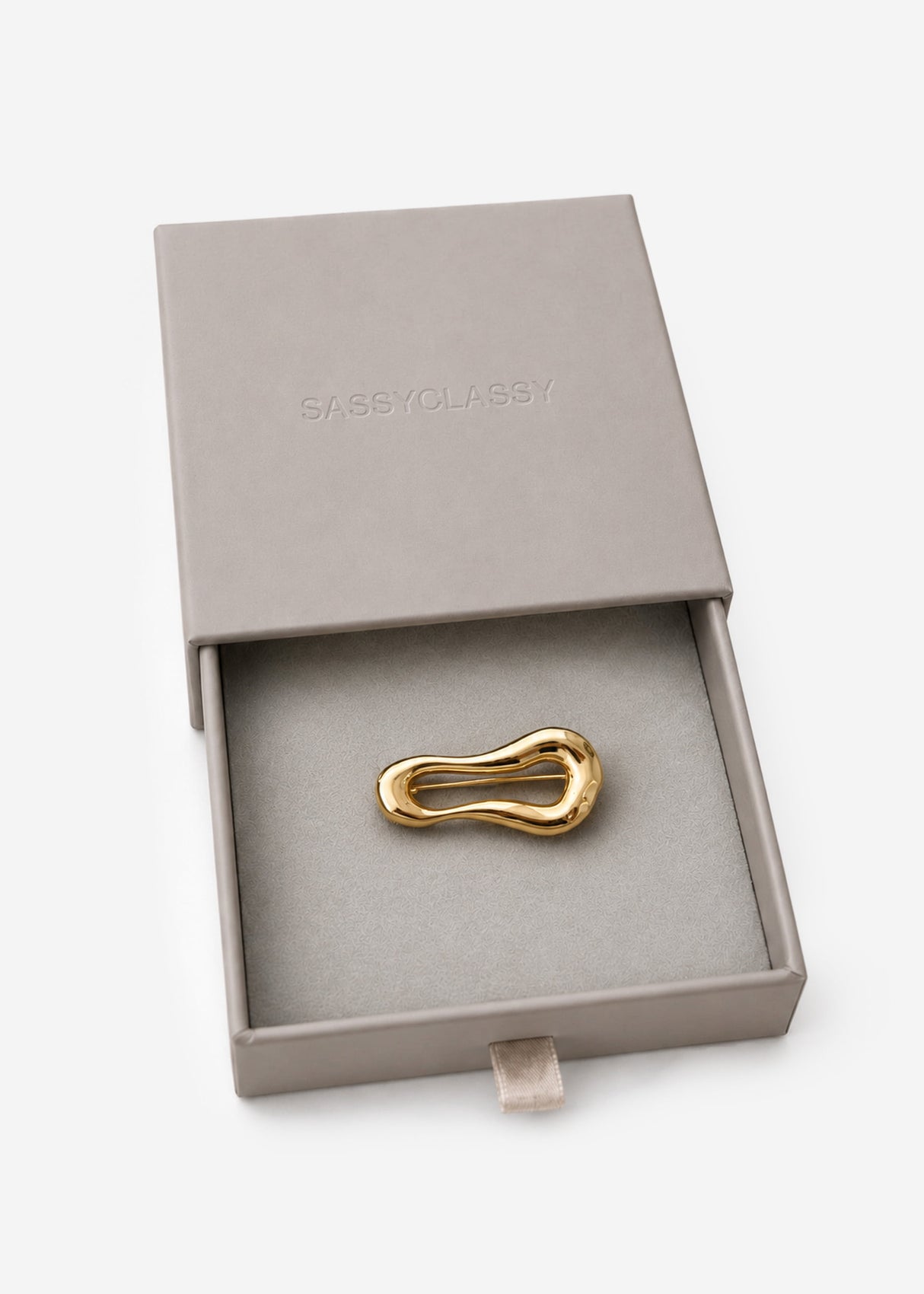Statement Brosche in geschwungener Form - gold