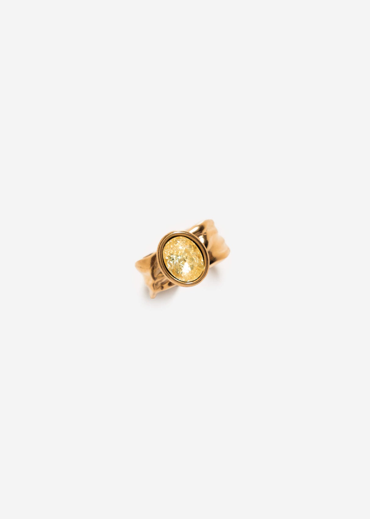 Statement ring with yellow gemstone in gold