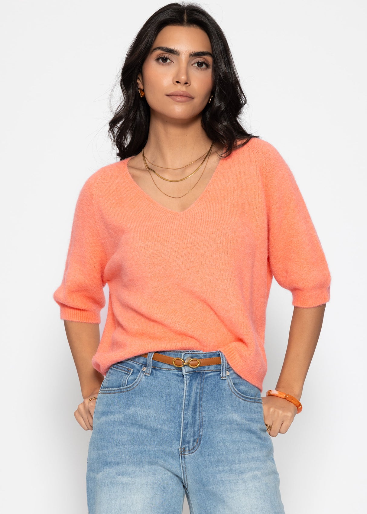 Knitted top with V-neck - coral