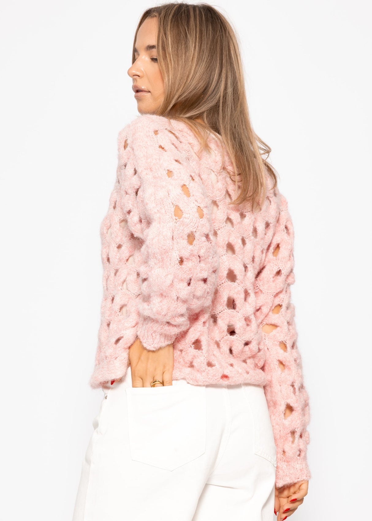 Knitting sweater with hole pattern - pink