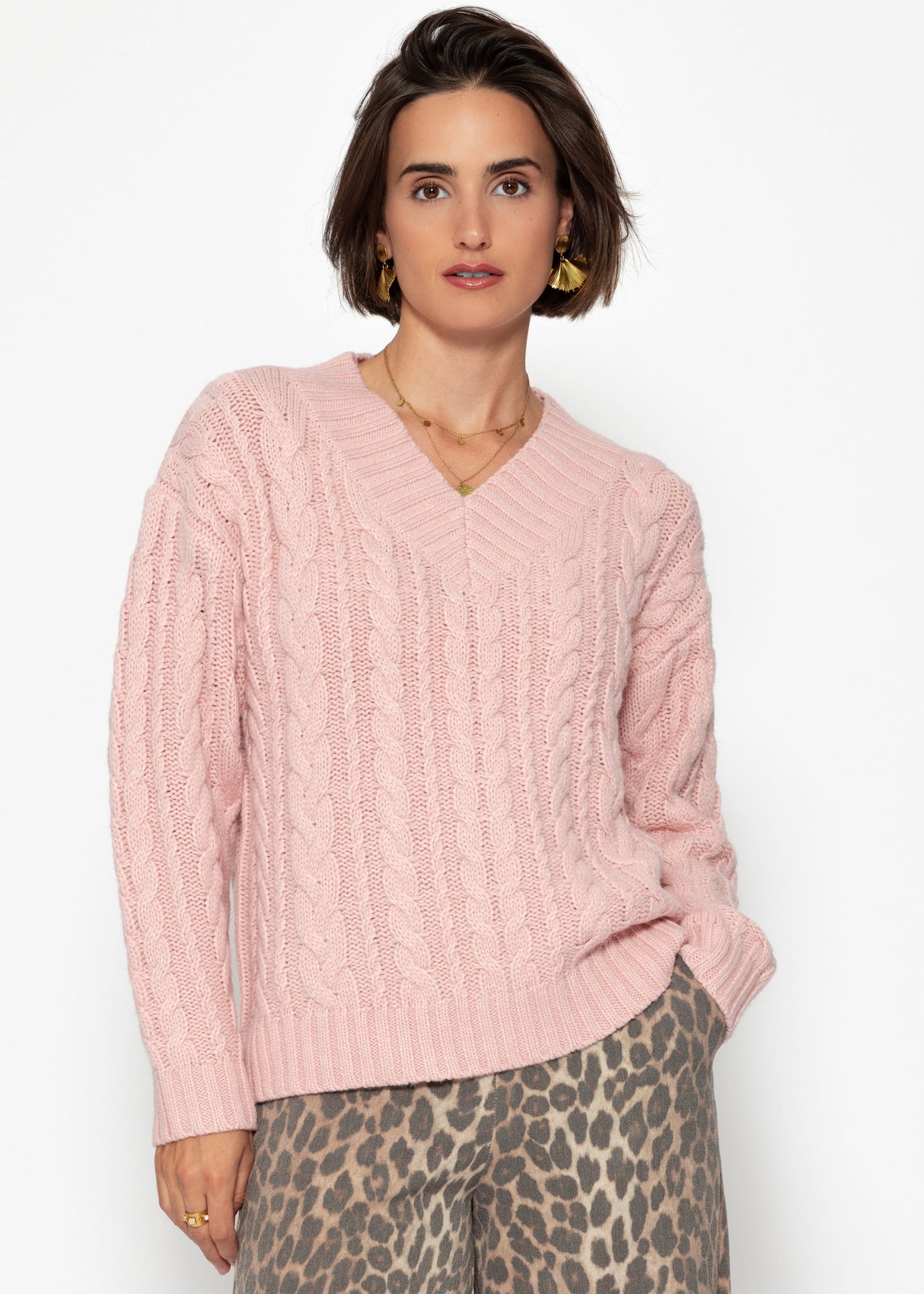 Cable-knit V-neck sweater - pink