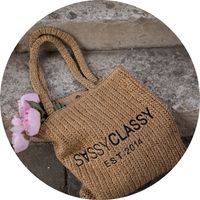 Woven straw bag with short handles and embroidered “SASSYCLASSY” lettering - Bags by SASSYCLASSY