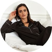 Women's black pajamas with white piping, a lapel collar, and long pants – sleepwear by SASSYCLASSY