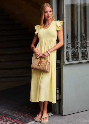 Maxi Musselin dress with ruffles and winged sleeves - butter yellow