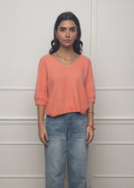 Knitted top with V-neck - coral