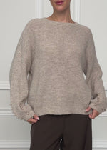 Sweaters with a pearl detail - beige