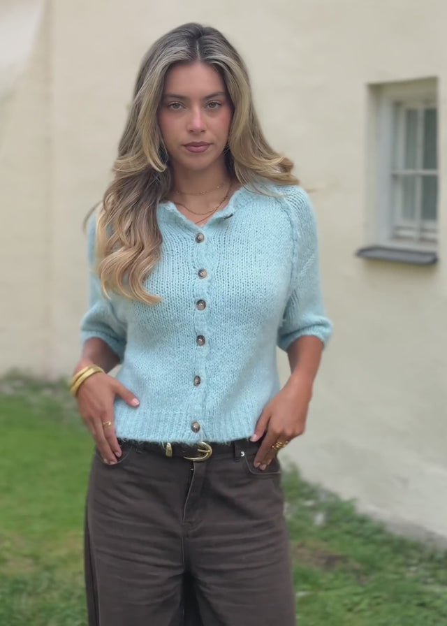 Short-sleeved cardigan with exposed seams - light blue by SASSYCLASSY