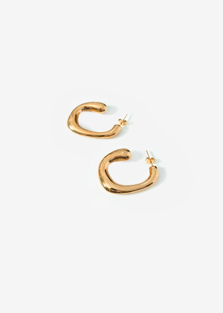 Curved organic hoop earrings - gold