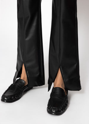 Faux leather thermal leggings with dividing seams and hem slit - black
