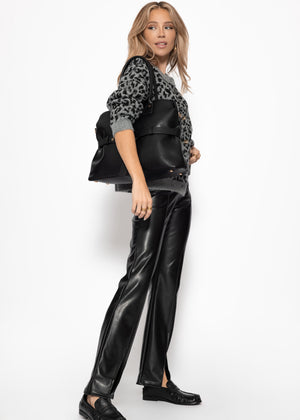 Faux leather thermal leggings with dividing seams and hem slit - black