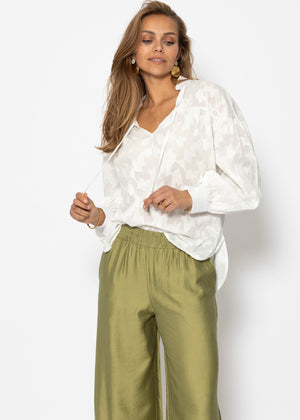 Slightly transparent jacquard blouse with tie detail - white