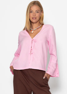 Linen blouse with trumpet sleeves and loop closure - pink