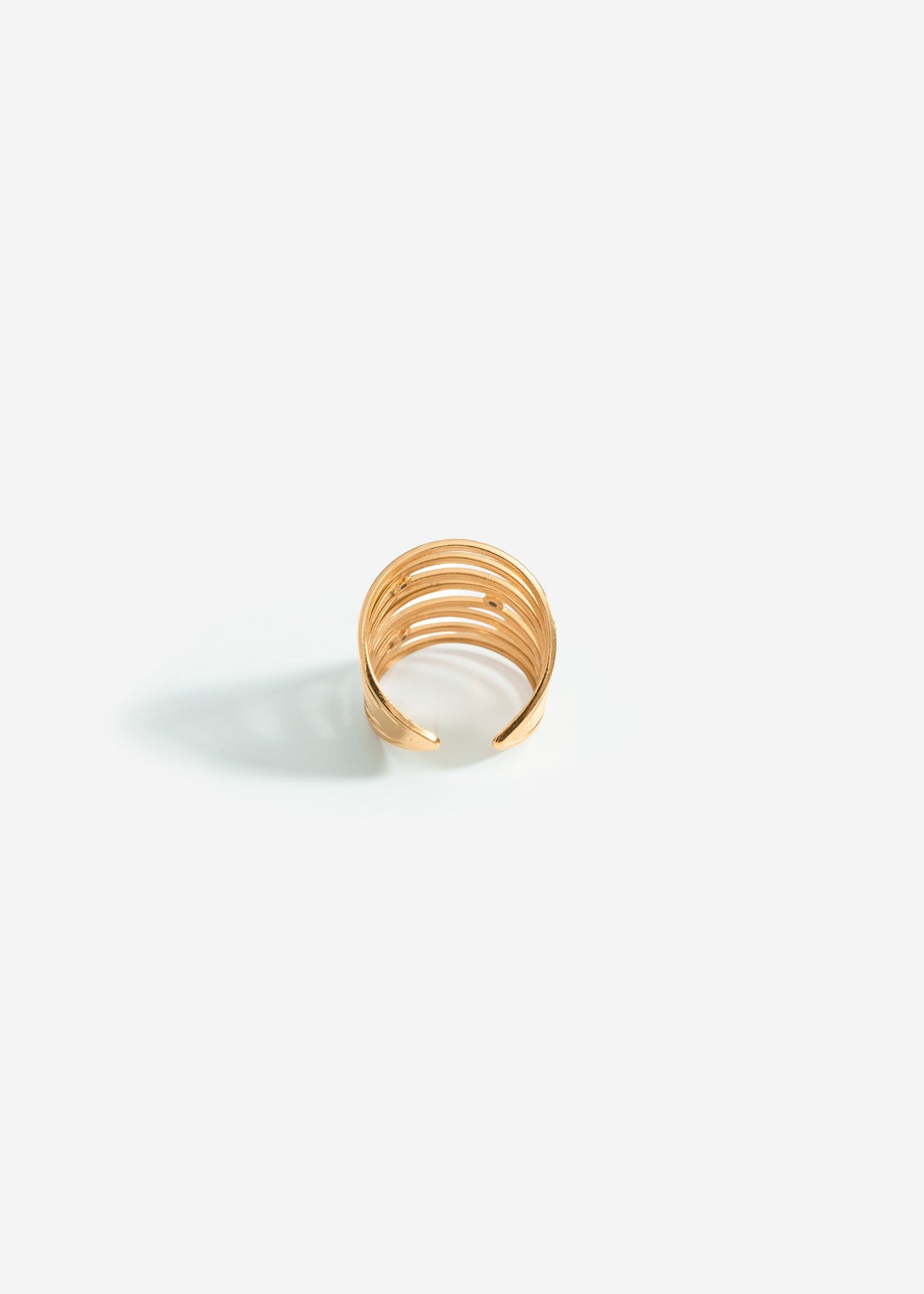 Multi-row ring with offset stones - gold