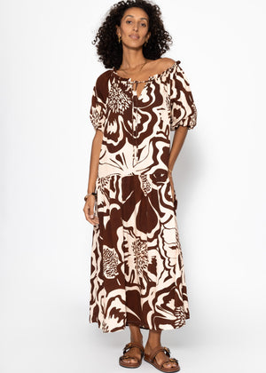 Volant dress with a large floral pressure - brown