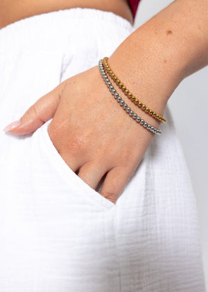 Armband mit Kugeln - gold