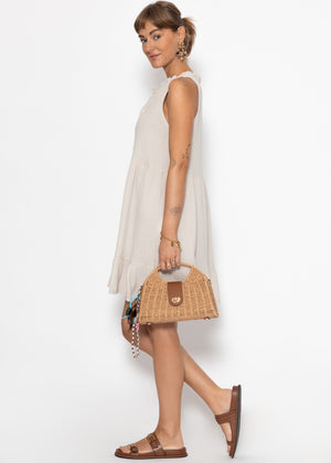 Small Musselin dress with ruffles - beige