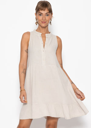 Small Musselin dress with ruffles - beige