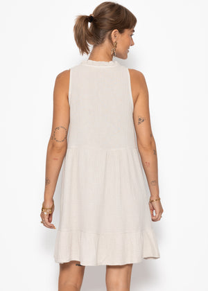 Small Musselin dress with ruffles - beige
