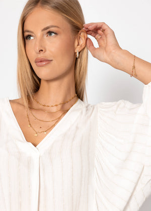Blouse with glitter stripes - off-white