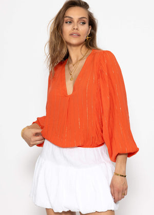 Blouse with glitter stripes - orange