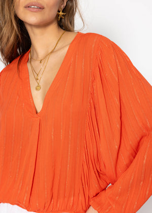 Blouse with glitter stripes - orange