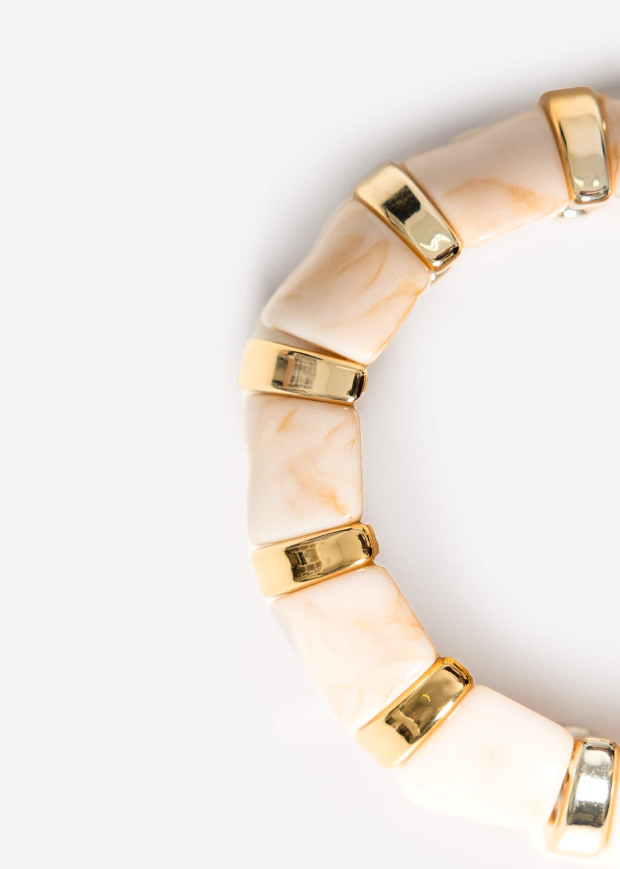 Wide bracelet with gold-colored elements - beige
