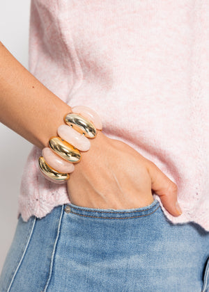 Wide bracelet with gold-colored elements - pink