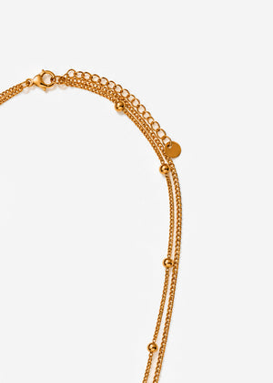 Doppelte Halskette mit maritimen Anhängern - gold