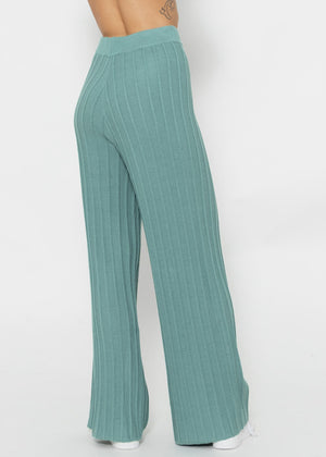 Flowing knitted trousers with ribbed structure - green